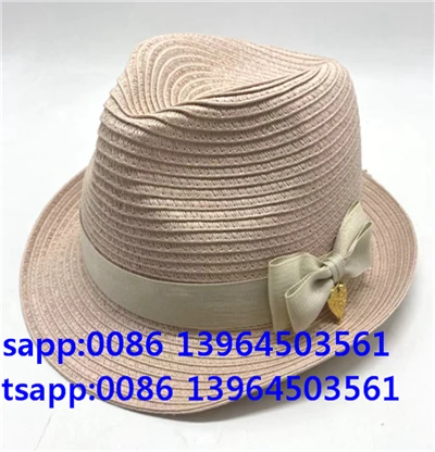 Phụ nữ màu hồng nhẹ giấy rơm fedora mũ bảo hiểm mặt trời